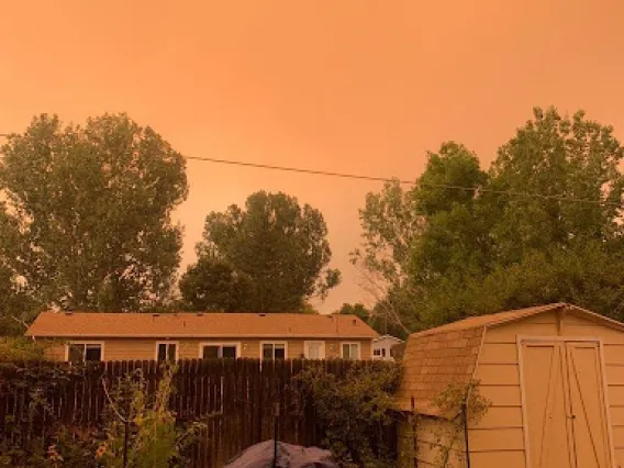 Orange haze that enveloped Fort Collins during the day time.