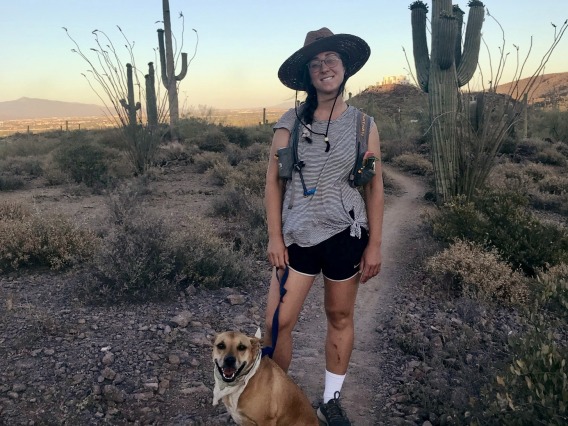 Anna Murveit portrait on trail in Arizona desert.