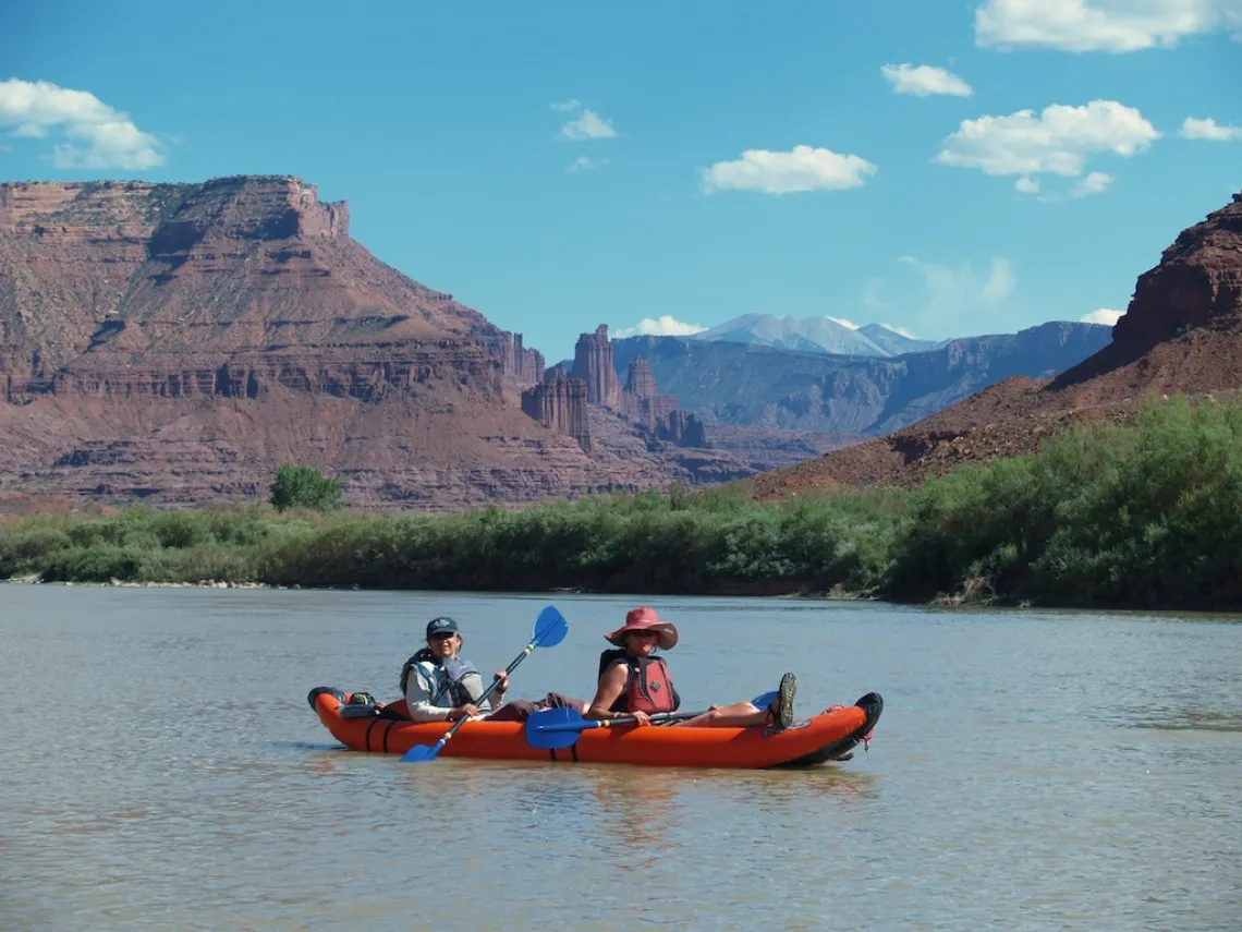 Michelle Baker and another person in a canoe on a lake