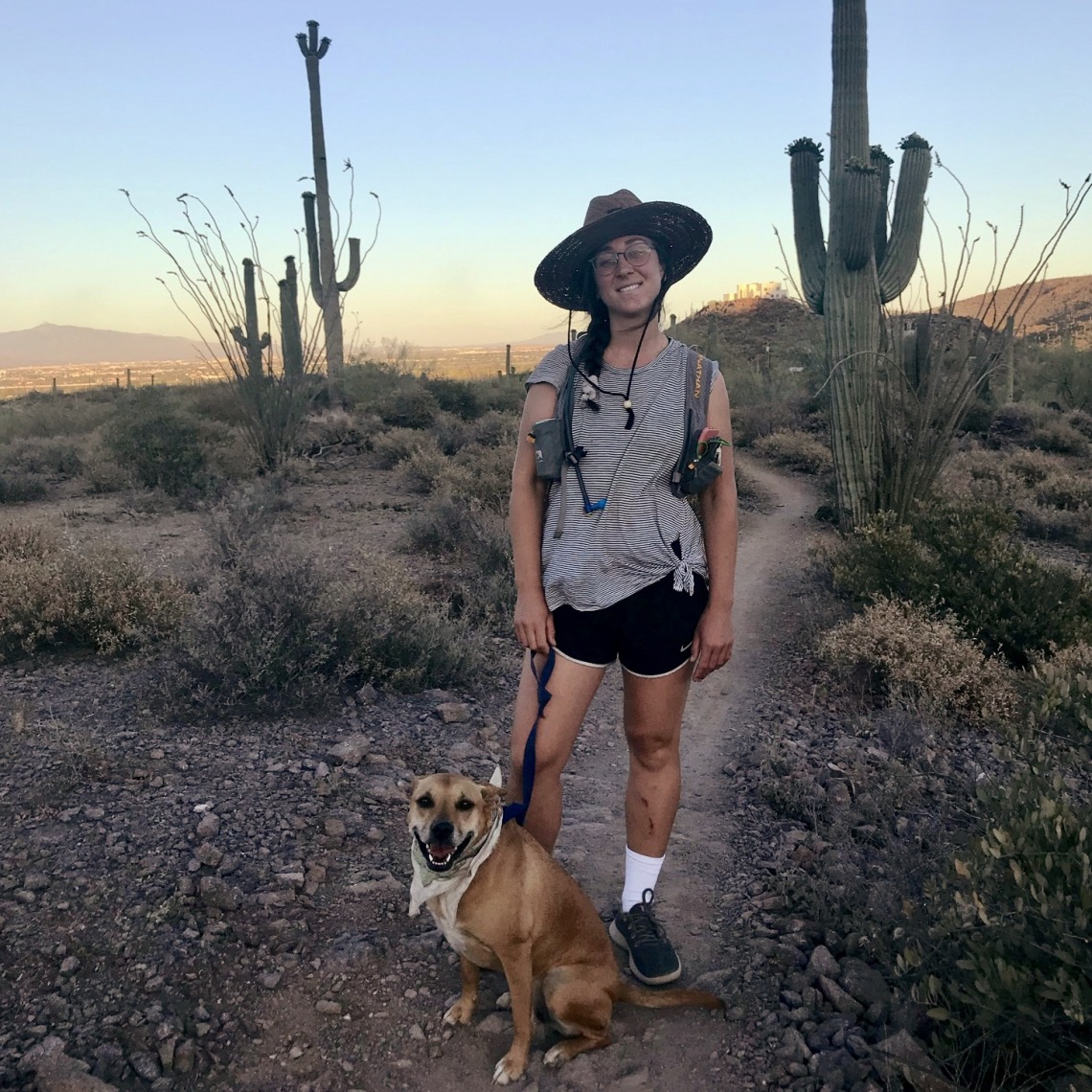 Anna Murveit portrait on trail in Arizona desert.