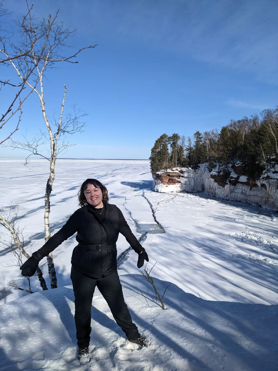 Erin in the snow with blue sky