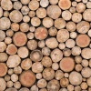 Many log ends pictured stacked, filling the entire frame